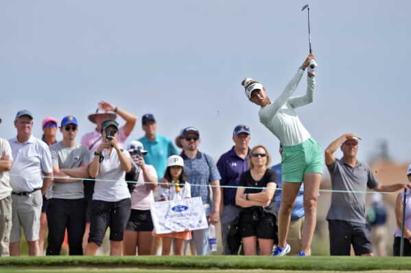 Nelly Korda hits from the ninth tee during the first round of LPGA Ford Championship golf tournament, Thursday, March 28, 2024, in Gilbert, Ariz. (AP Photo/Matt York)