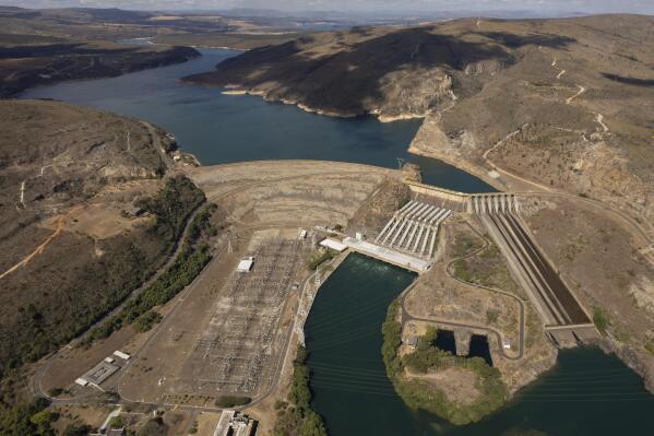 FILE - The Furnas hydroelectric dam sits along the Rio Grande River in Sao Jose da Barra, Brazil, Sept. 1, 2021. (AP Photo/Andre Penner, File)