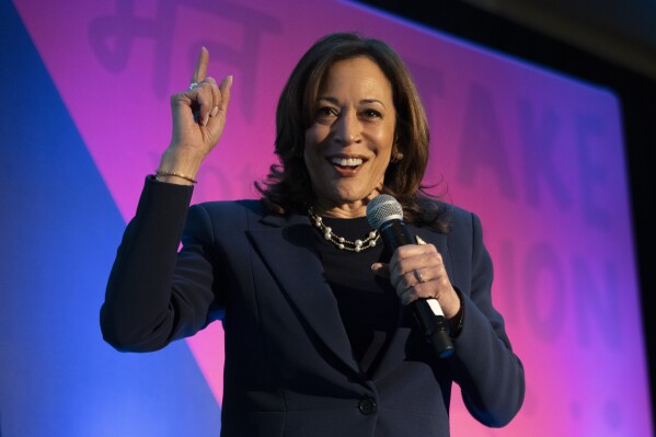 FILE - Vice President Kamala Harris speaks to the Indian American Impact Project's Annual Summit, May 15, 2024, in Washington. The Biden campaign says Vice President Kamala Harris has accepted an invitation from CBS News to debate former President Donald Trump’s vice presidential pick this summer. Trump is expected to pick a running mate shortly before the Republican National Convention begins in Milwaukee on July 15. (AP Photo/Jacquelyn Martin, File)