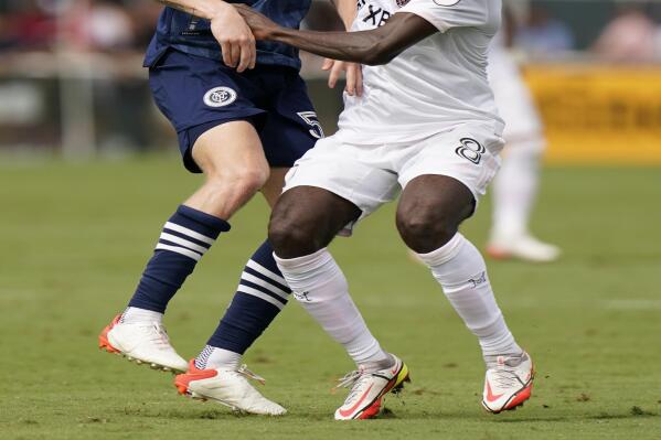 New York City FC midfielder Keaton Parks, left, and Inter Miami midfielder Blaise Matuidi (8) battle for the ball, Saturday, Oct. 30, 2021, during the first half of an MLS soccer match in Fort Lauderdale, Fla. (AP Photo/Wilfredo Lee)