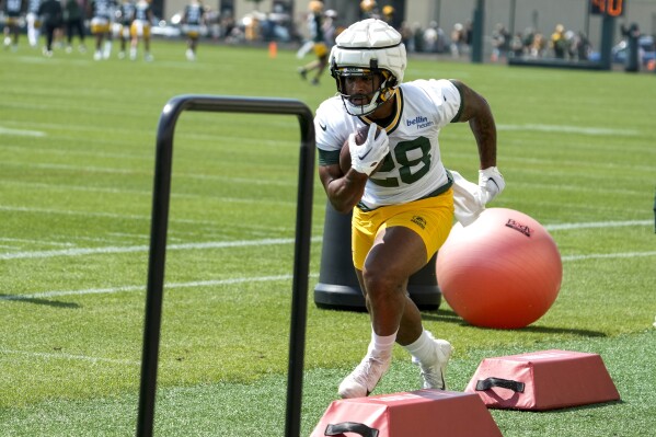Packers' AJ Dillon eager to rebound after busy offseason in which he wrote  a book and became a dad