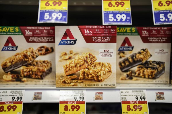 Atkins weight loss products are seen on sale at a Kroger supermarket, Friday, April 12, 2024, in Marietta, Ga. (AP Photo/Mike Stewart)