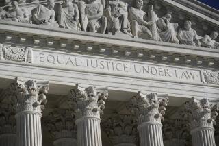 FILE - In this Nov. 4, 2020 file photo, the Supreme Court is seen in Washington.  (AP Photo/J. Scott Applewhite, File)