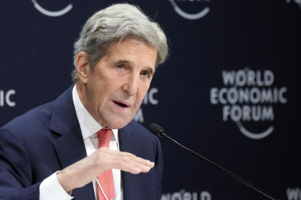 FILE - John F. Kerry, Special Presidential Envoy for Climate of the United States, gestures during a news conference at the World Economic Forum in Davos, Switzerland, May 24, 2022. Kerry said Friday, July 1, that setbacks for President Joe Biden's climate efforts at home have “slowed the pace” of some of the commitments from other countries to cut climate-wrecking fossil fuels, but he insisted the U.S. would still achieve its own ambitious national climate goals in time. (AP Photo/Markus Schreiber, File)