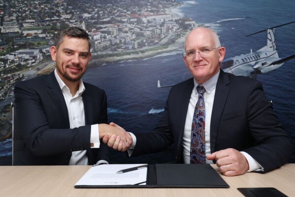 Photo of representatives from Textron Aviation and BAA Training (left to right: Marijus Ravoitis, BAA Training; Bob Gibbs, Textron Aviation) (Photo: Business Wire)