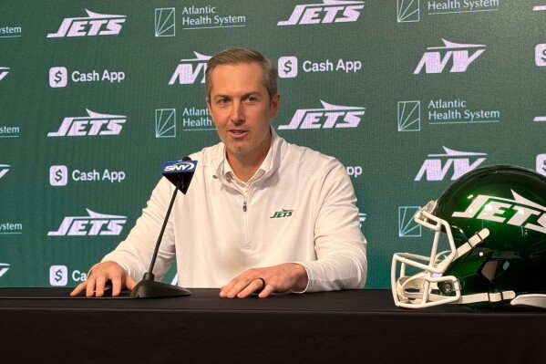 New York Jets general manager Darren Mougey speaks to reporters at the team's facility in Florham Park, New Jersey, on Monday, April 21, 2025. (AP Photo/Dennis Waszak Jr.)