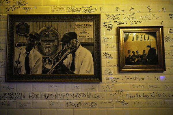 A "wall of fame" at The Marabi Club in downtown Johannesburg, South Africa, Friday, May 9, 2025. (AP Photo/Themba Hadebe)
