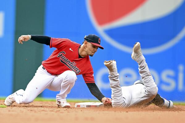 Miami Marlins' Yuli Gurriel looks on during the fourth inning in the first  baseball game of a doubleheader against the Cleveland Guardians, Saturday,  April 22, 2023, in Cleveland. (AP Photo/Nick Cammett Stock