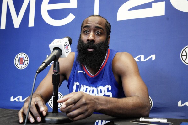 James Harden responds to a reporter's question as he is introduced as the newest member of the Los Angeles Clippers at a news conference at the NBA baketball team's training facility Thursday, Nov. 2, 2023, in Los Angeles. (AP Photo/Richard Vogel)