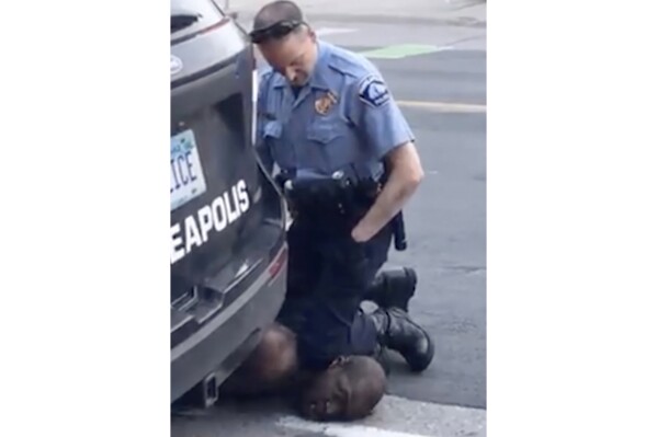 In this image from video provided by Darnella Frazier, Minneapolis Police Officer Derek Chauvin kneels on the neck of George Floyd, a handcuffed man who was pleading that he could not breathe, on Monday, May 25, 2020. (Darnella Frazier via AP, File)