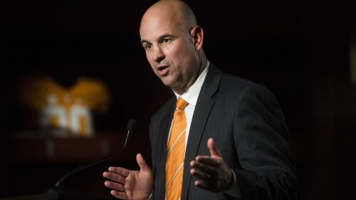 FILE - New Tennessee NCAA college football head coach Jeremy Pruitt speaks at his introduction ceremony in Knoxville, Tenn., Thursday, Dec. 7, 2017. The NCAA fined Tennessee more than $8 million on Friday, July 14, 2023, and issued a scathing report outlining more than 200 infractions during the three-year tenure of former coach Jeremy Pruitt. The Volunteers escaped a postseason ban. (Caitie McMekin/Knoxville News Sentinel via AP, File)