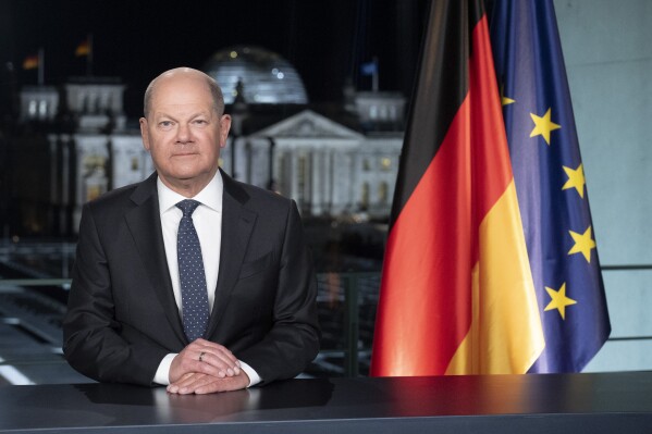 EMBARGO - UNTIL DEC. 31, 2023 00:00 A.M. CET - FREE FOR SUNDAY DEC. 31, 2023 NEWSPAPERS - German Chancellor Olaf Scholz poses for photographs during the recording of his New Year's speech at the chancellery in Berlin, Germany, Friday, Dec. 29, 2023. (AP Photo/Markus Schreiber, Pool)
