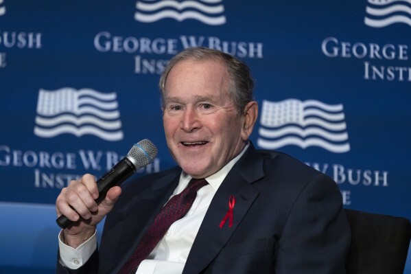 Former President George W. Bush speaks during an event to mark the 20th anniversary year of the President's Emergency Plan for AIDS Relief (PEPFAR) at the U.S. Institute of Peace in Washington, Feb. 24, 2023. As billions of dollars for a global HIV/AIDS program credited with saving millions of lives remains in limbo, the George W. Bush Institute is urging the U.S. Congress to keep money flowing for it. In a letter sent to Congress on Oct. 25, the former Republican president's institute pleaded with Congress to keep funding PEPFAR. (AP Photo/J. Scott Applewhite, File)