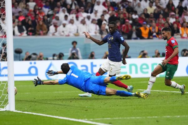 France's Randal Kolo Muani scores his side's second goal during the World Cup semifinal soccer match between France and Morocco at the Al Bayt Stadium in Al Khor, Qatar, Wednesday, Dec. 14, 2022. (AP Photo/Manu Fernandez)