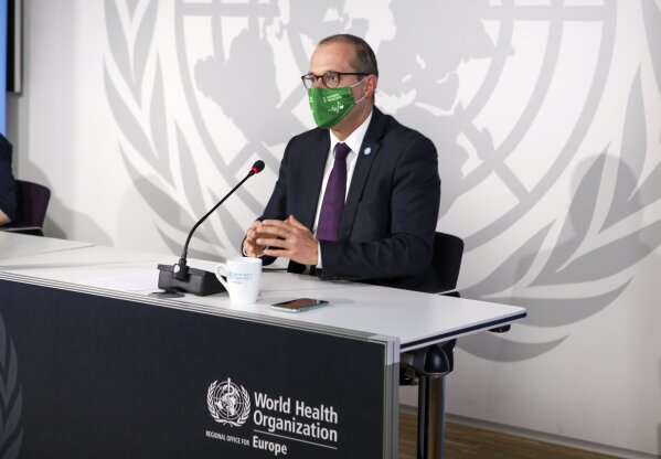 In this photo provided by the World Health Organization, Dr. Hans Kluge, regional director for WHO Europe, gestures during a virtual news conference at its headquarters in Copenhagen, Denmark, on Thursday, Oct. 15. The head of the World Health Organization’s Europe office said the exponential surge of coronavirus cases across the continent has warranted the restrictive measures being taken, calling them “absolutely necessary” to stop the pandemic. In a meda briefing on Thursday, Dr. Hans Kluge warned that even more drastic steps might be needed in such “unprecedented times.” (David Barrett/World Health Organization via AP)