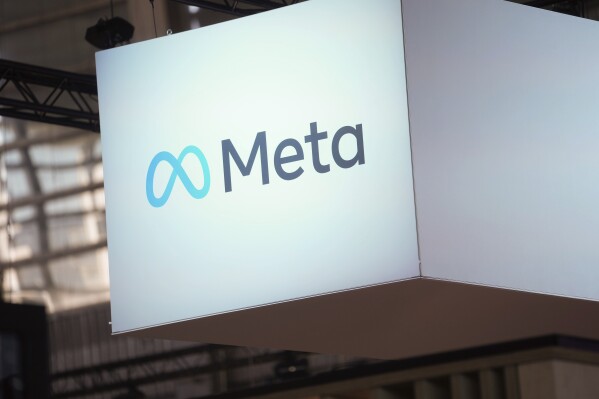 FILE - The Meta logo is seen at the Vivatech show in Paris, France, Wednesday, June 14, 2023. Meta said Monday, June 10, 2024, it wants to use data from users in privacy-conscious Europe to train its artificial intelligence models. It's facing concerns about data protection while battling to keep up with rivals like OpenAI and Google. (AP Photo/Thibault Camus, File)