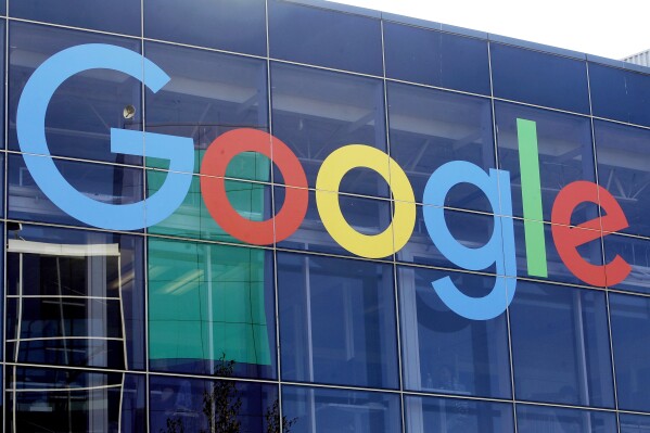 A sign is displayed on a Google building at their campus in Mountain View, Calif., on Sept. 24, 2019. (AP Photo/Jeff Chiu, File)