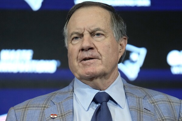 Former New England Patriots head coach Bill Belichick faces reporters during a news conference, Thursday, Jan. 11, 2024, in Foxborough, Mass., held to announce that he has agreed to part ways with the team. (AP Photo/Steven Senne)