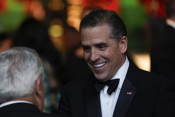 FILE - Hunter Biden talks with guests before President Joe Biden offers a toast during a State Dinner for India's Prime Minister Narendra Modi at the White House in Washington, June 22, 2023. The Republican chairmen of three key House committees are joining forces to probe the Justice Department's handling of charges against Hunter Biden after making sweeping claims about misconduct at the agency. (AP Photo/Susan Walsh)