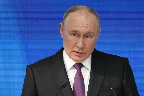 Russian President Vladimir Putin delivers his state-of-the-nation address in Moscow, Russia, Thursday, Feb. 29, 2024. (AP Photo/Alexander Zemlianichenko)