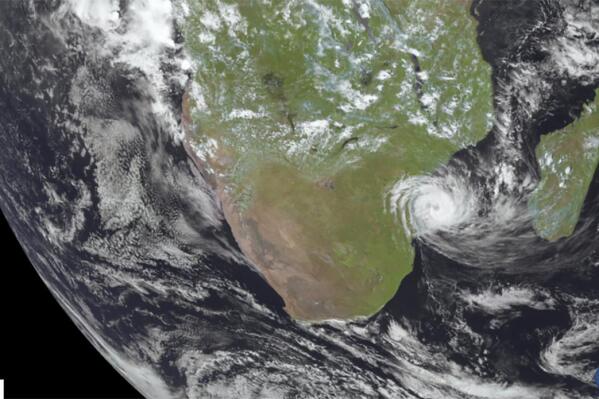 This image from Meteosat-9 satellite shows Tropical Cyclone Freddy, center right, and Mozambique on Friday, Feb. 24, 2023. The damaging tropical cyclone dumped “dangerous and exceptional rainfall levels” over Mozambique as the long-lasting weather system continues to wreak havoc across southern Africa, the United Nations weather agency said. (NOAA via AP)