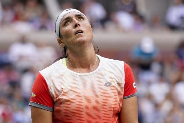 Ons Jabeur, of Tunisia, reacts after losing a point to Iga Swiatek, of Poland, during the women's singles final of the U.S. Open tennis championships, Saturday, Sept. 10, 2022, in New York. (AP Photo/Charles Krupa)