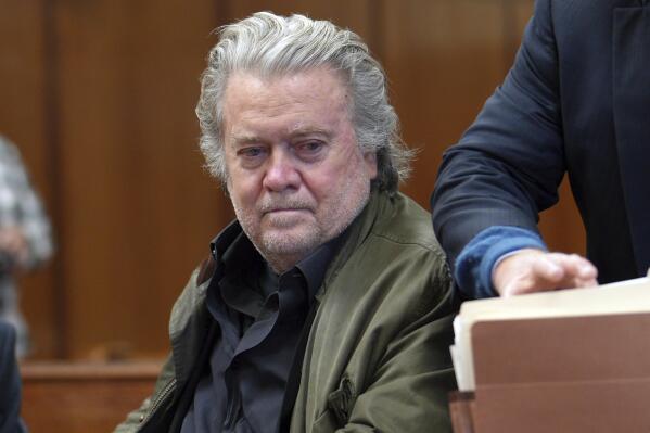Former President Donald Trump's longtime ally Steve Bannon appears in Manhattan Supreme Court, Tuesday, Oct. 4, 2022. Bannon's trial on charges he defrauded donors who gave money to build a wall on the U.S. southern border might not happen until late next year, a judge said Tuesday. (Curtis Means/DailyMail via AP, Pool)