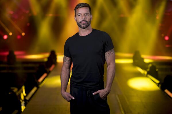 FILE - Ricky Martin poses for a portrait in San Juan, Puerto Rico on Jan. 27, 2020. Martin filed a lawsuit Wednesday, Sept. 7, 2022,  against his nephew accusing him of extortion, malicious persecution, abuse of law and damages stemming from false allegations that attorneys say cost the artist millions of dollars in lost income. (AP Photo/Carlos Giusti, File)