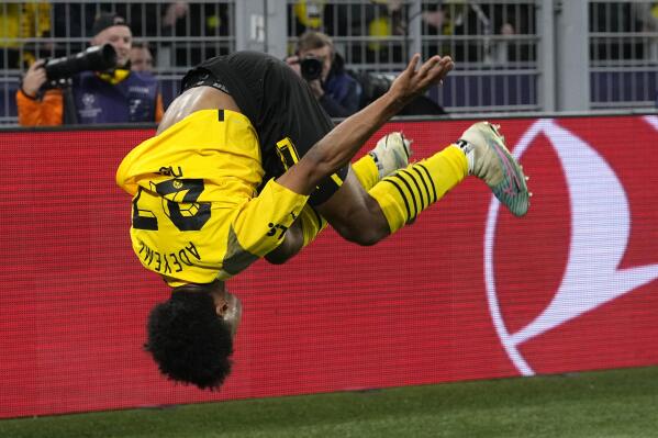 Dortmund's Karim Adeyemi celebrates after scoring his side's first goal during the Champions League, round of 16, first leg soccer match between Borussia Dortmund and Chelsea FC in Dortmund, Germany, Wednesday, Feb. 15, 2023. (AP Photo/Martin Meissner)