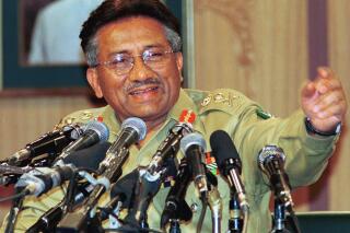 FILE - Then Pakistan Gen. Pervez Musharraf gestures at a news conference, Thursday March 23, 2000, in Islamabad. Gen. Musharraf, who seized power in a bloodless coup and later led a reluctant Pakistan into aiding the U.S. war in Afghanistan against the Taliban, has died, an official said Sunday, Feb. 5, 2023. He was 79.(AP Photo/B.K. Bangash, File)