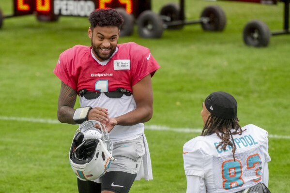 Miami Dolphins quarterback Tua Tagovailoa attends a practice session in Frankfurt, Germany, Thursday, Nov. 2, 2023. The Miami Dolphins are set to play the Kansas City Chiefs in an NFL game in Frankfurt on Sunday Nov. 5, 2023. (AP Photo/Michael Probst)