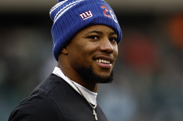 Saquon Barkley, Giants settle on 1-year deal worth up to $11 million, AP  source says