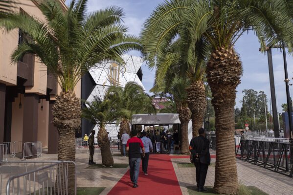 Visitors queue to attend a screening during the Marrakech International Film Festival in Morocco, Monday, Dec. 2, 2024. (AP Photo/Mosa'ab Elshamy)