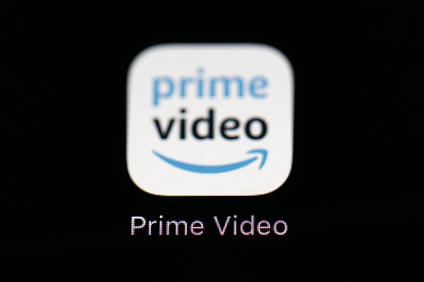 FILE - The Amazon Prime Video streaming app is seen on an iPad screen, March 19, 2018, in Baltimore. Prime will include ads beginning Monday, Jan. 29, 2024, the company said in an email to U.S. members, setting a date for an announcement it made back in September 2023. (AP Photo/Patrick Semansky, File)
