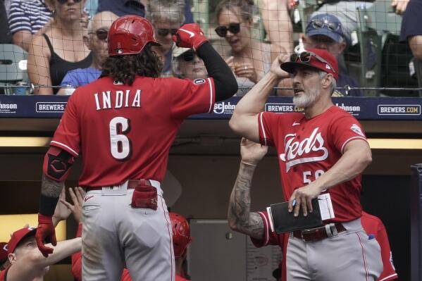 Jonathan India of the Cincinnati Reds reacts after being hit by a