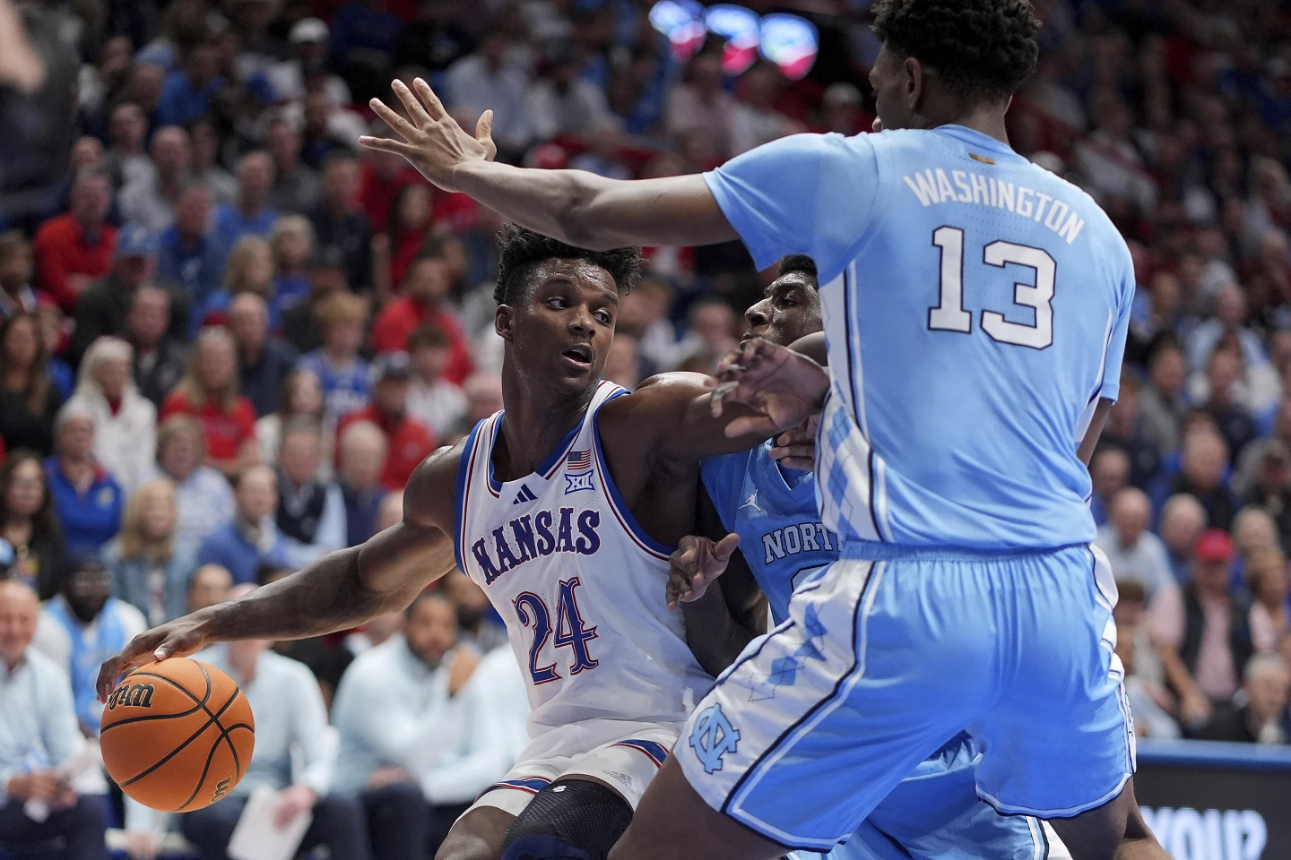 No. 1 Kansas blows 20-point first-half lead, holds on to beat No. 9 North Carolina 92-89