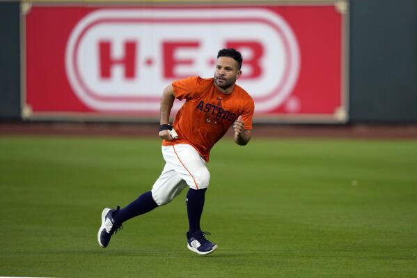 Houston Astros' Jose Altuve runs in the outfield before a baseball game against the Texas Rangers Sunday, April 16, 2023, in Houston. (AP Photo/David J. Phillip)