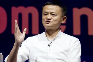 FILE - In this Oct. 12, 2018, file photo, Chairman of Alibaba Group Jack Ma speaks during a seminar in Bali, Indonesia. China’s highest-profile entrepreneur, e-commerce billionaire Jack Ma, appeared Wednesday, Jan. 20, 2021, in a video posted online, ending a 2 1/2-month disappearance from public view that prompted speculation about his status and his business empire’s future. In the 50-second video, Ma congratulated teachers supported by his charitable foundation and made no mention of his absence from public view and scrutiny of his Alibaba Group and Ant Group by regulators.(AP Photo/Firdia Lisnawati, File)