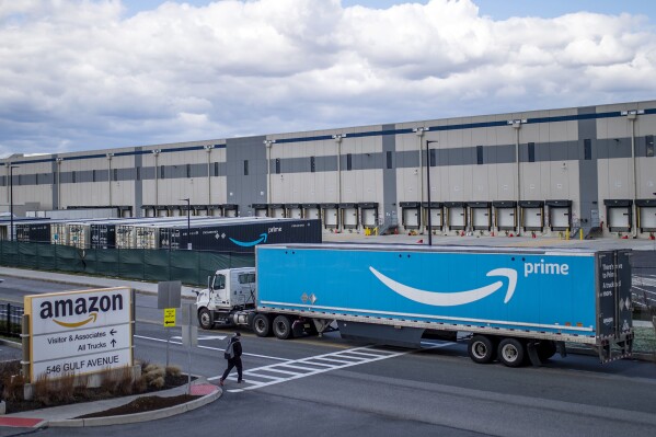 FILE - A truck arrives at the Amazon warehouse facility, in the Staten Island borough of New York, April 1, 2022. Vermont Sen. Bernie Sanders has opened a Senate investigation into Amazon’s warehouse safety practices, the latest in a series of probes he’s initiated against big corporations in his role as chairman of a committee that oversees health and labor issues.(AP Photo/Eduardo Munoz Alvarez, File)