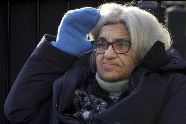 Laila Soueif, who has been on hunger strike for more than 129 days seeking the release of her son Alaa Abdel Fattah from prison in Egypt, sits outside Downing Street in London, Wednesday, Feb. 5, 2025. (AP Photo/Kirsty Wigglesworth, File)