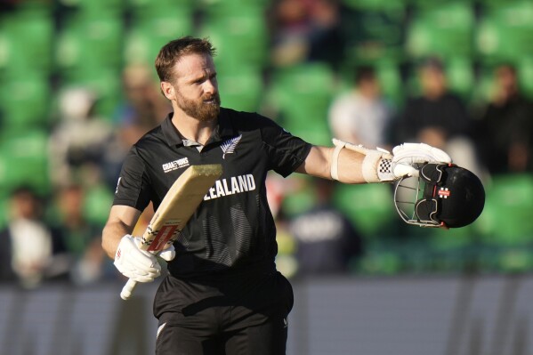 New Zealand's Kane Williamson celebrates after scoring a century during the ICC Champions Trophy semifinal cricket match between New Zealand and South Africa at Gaddafi Stadium in Lahore, Pakistan, Wednesday, March 5, 2025. (AP Photo/Anjum Naveed)