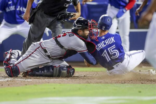 Randal Grichuk lifts Jays over Braves in 10