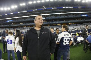 FILE - In this Jan. 5, 2019, file photo, former New Jersey Gov. Chris Christie walks on the field before a NFC wild-card NFL football game between the Dallas Cowboys and the Seattle Seahawks in Arlington, Texas. Christie has joined the board of directors of the New York Mets. Christie was New Jersey's governor from January 2010 to January 2018. His son Andrew has worked for the team since 2018 and is the Mets' coordinator of international scouting. (AP Photo/Ron Jenkins, File)