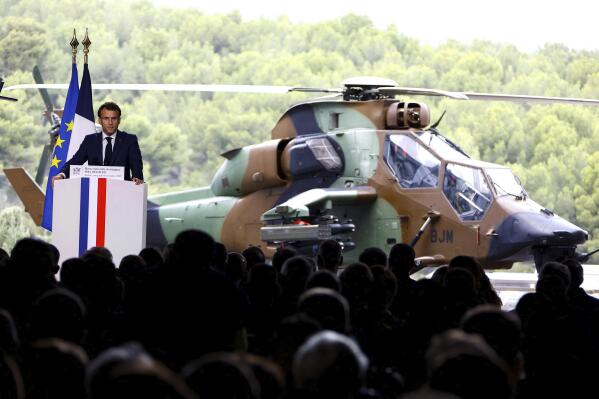 French President Emmanuel Macron delivers his speech at the French Navy base of Toulon, southern France, Wednesday, Nov. 9, 2022. Emmanuel Macron unveils the country's military strategy through the end of the decade for his nuclear-armed country, in the midst of Russia's war in Ukraine. (Eric Gaillard, Pool via AP)