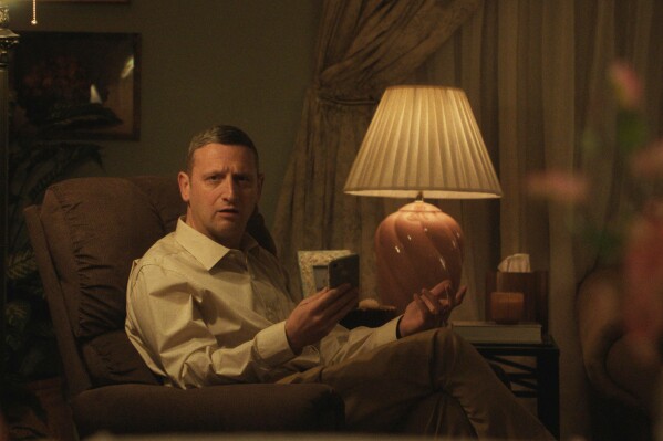 This image released by A24 shows Tim Robinson in a scene from 