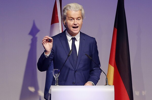 FILE - In this Saturday, Jan. 21, 2017 file photo, Geert Wilders delivers a speech at a meeting of European Nationalists in Koblenz, Germany. Geert Wilders has won a massive victory in a Dutch election and is in pole position to form the next governing coalition and possibly become the Netherlands' next prime minister. (AP Photo/Michael Probst, File)