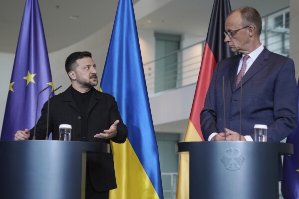 Germany's Chancellor Friedrich Merz, right, and Ukraine's President Volodymyr Zelenskyy attend a news conference at the chancellery in Berlin, Germany, Wednesday, May 28, 2025.(AP Photo/Markus Schreiber)