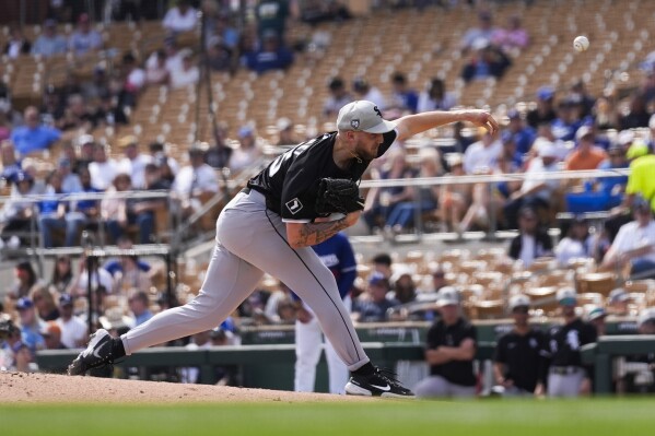 Chicago White Sox starting pitcher Garrett Crochet throws during the second inning of a spring training baseball game against the Los Angeles Dodgers in Phoenix, Tuesday, Feb. 27, 2024. (AP Photo/Ashley Landis)