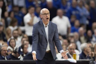 UConn coach Dan Hurley yells to the team during the first half of an NCAA college basketball game against Creighton on Tuesday, Feb. 20, 2024, in Omaha, Neb. (AP Photo/Rebecca S. Gratz)