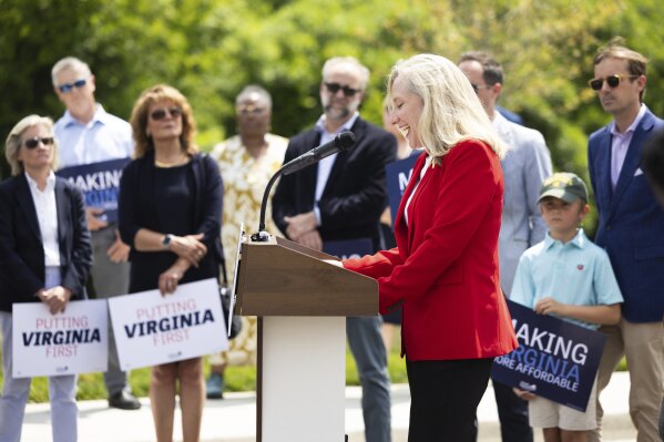 Democratic gubernatorial candidate Abigail Spanberger speaks during a press conference in front of a new housing development in Sandston, Va., Friday, June 6, 2025. (Mike KRopf/Richmond Times-Dispatch via AP)